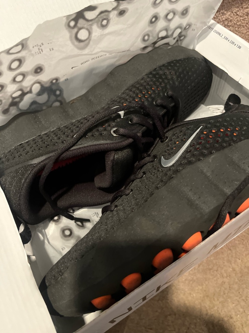Preowened Nike Mind Black Sneakers with Orange Sole Accents size 9.5
